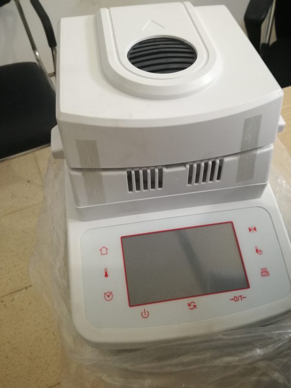 Dessiccateur, balance à humidité avec lampe halogène.